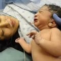 A mom is looking at her child