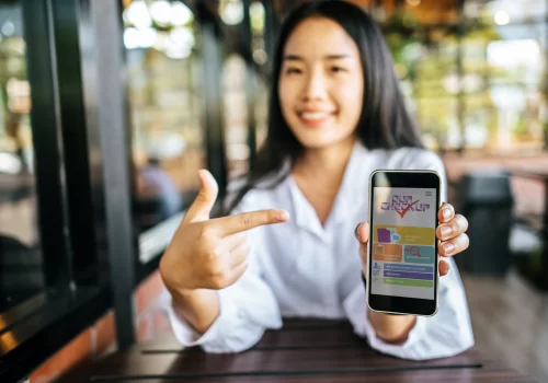 A girl showing the application of OurCheckup